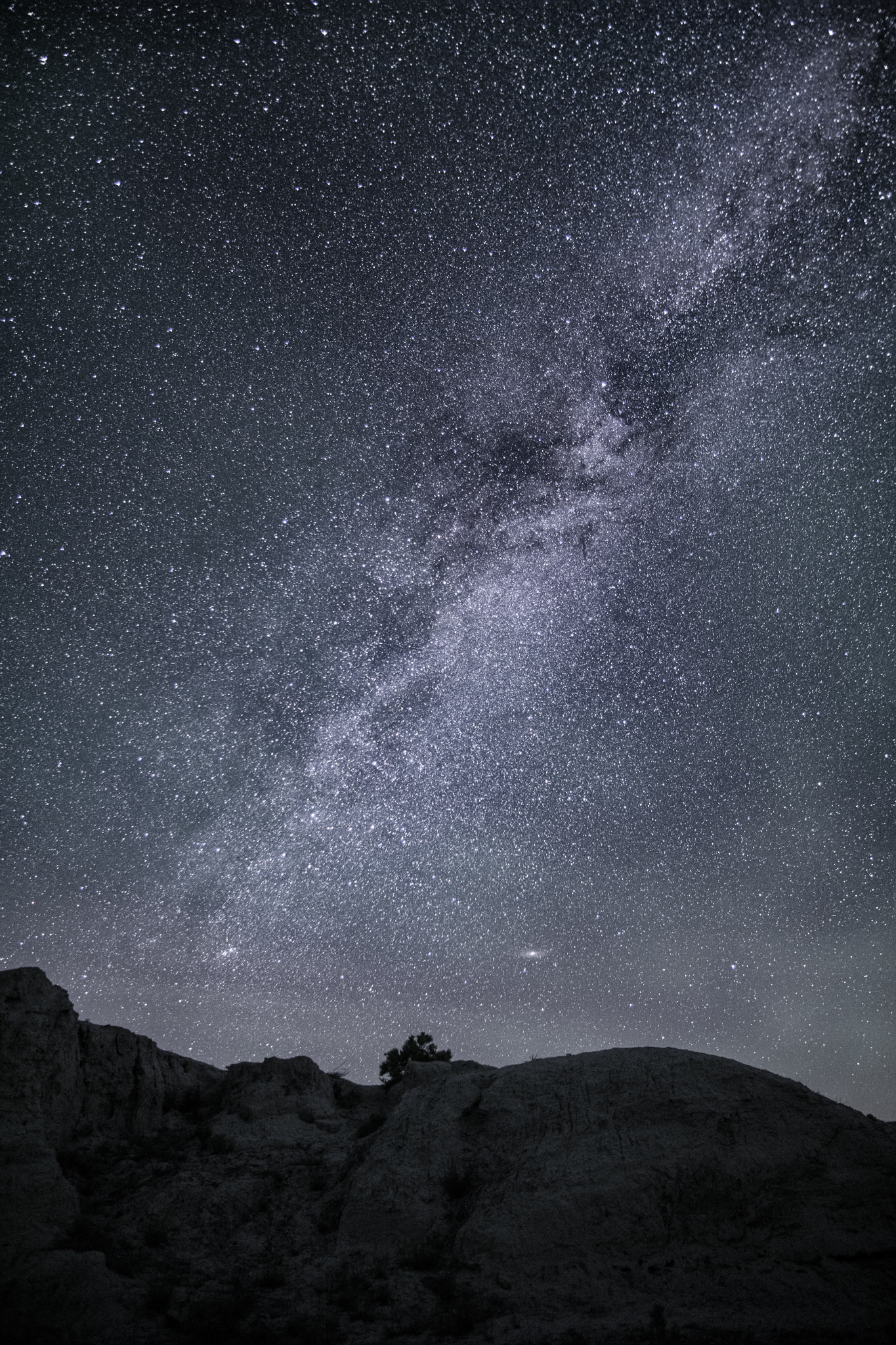 The Milky Way over some desert rock